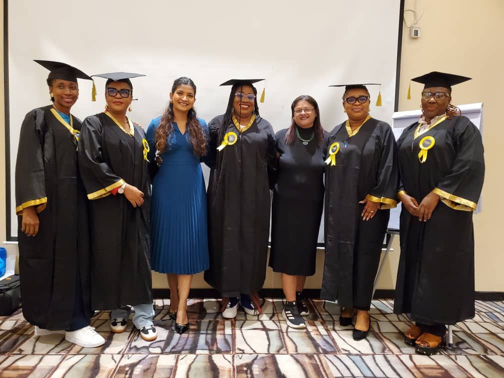 Graduates and facilitators celebrating completion of Air Transportation Handling training