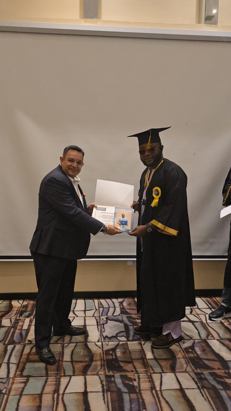 Facilitation in Air Transportation Handling graduate receiving his certificate